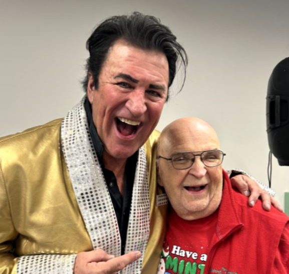 Frank and Bill smiling at the camera