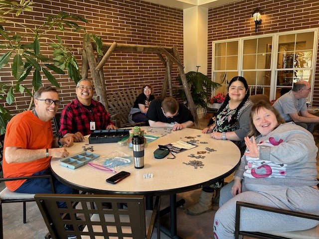 program members hanging out on the porch